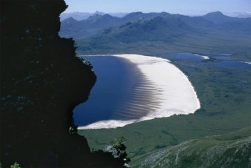 View from the Frankland Range of the beach of Lake Pedder, the plains near Lake Maria and Mt. Wedge in the distance, Tasmania, 1971 Olegas Truchanas