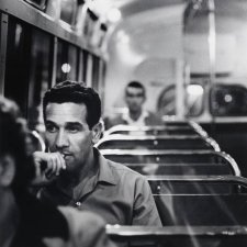 Charles Perkins on bus to Tranby Aboriginal College, Glebe