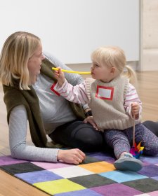 A mother and daughter participating in Portrait Play