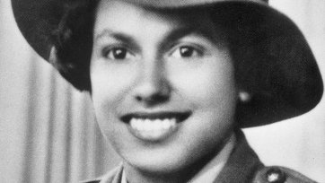 Studio portrait of servicewoman Lance Corporal Kathleen Jean Mary (Kath) Walker, c.1942 