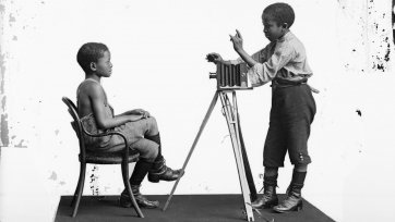 Albert Jonas and John Xiniwe of The African Choir, 1891 London Stereoscopic Co.