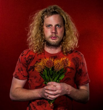 Self-portrait with flowers (presumed native), 2015 by Liam James