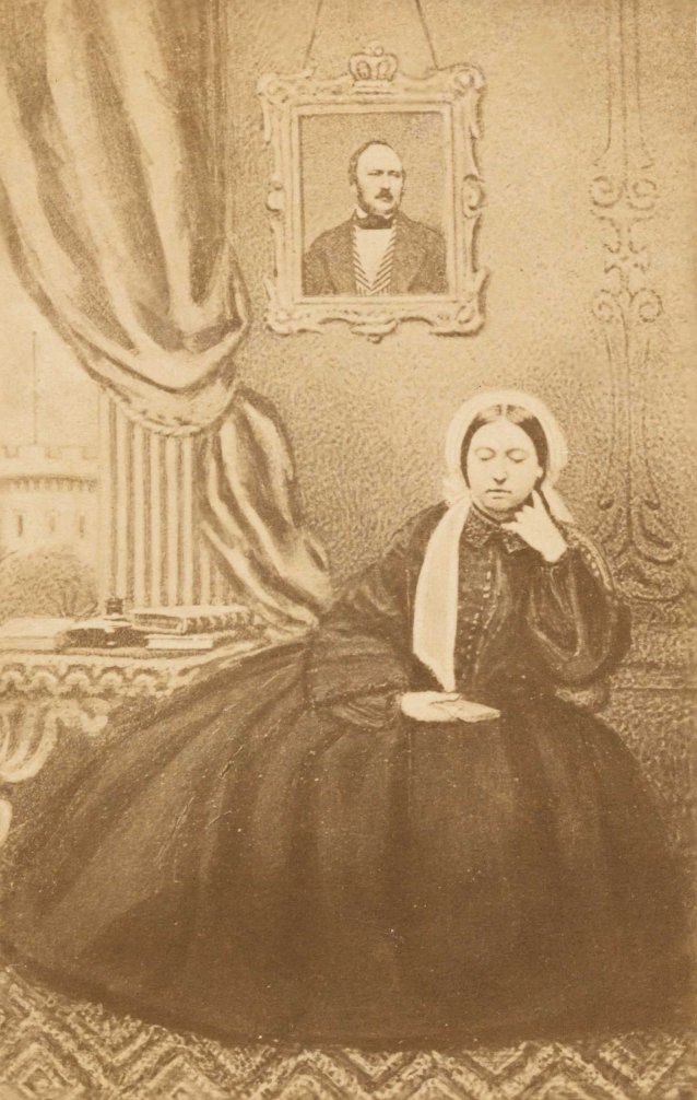 Queen Victoria in mourning, with a portrait of Prince Albert