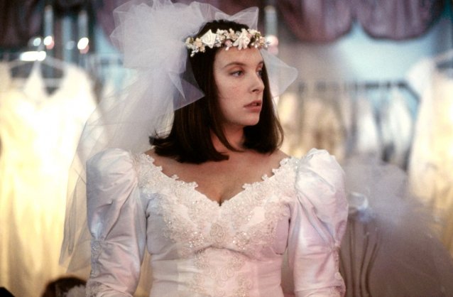 Toni Collette as Muriel trying on a wedding dress by Robert McFarlane, Muriel’s Wedding, 1994