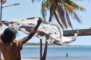 Anindilyakwa artist Vera Lalara making bush-dyed textiles , 2022